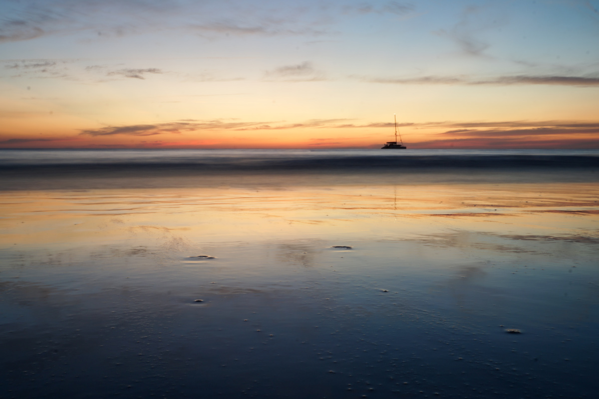 Sunset on the beach with reflection