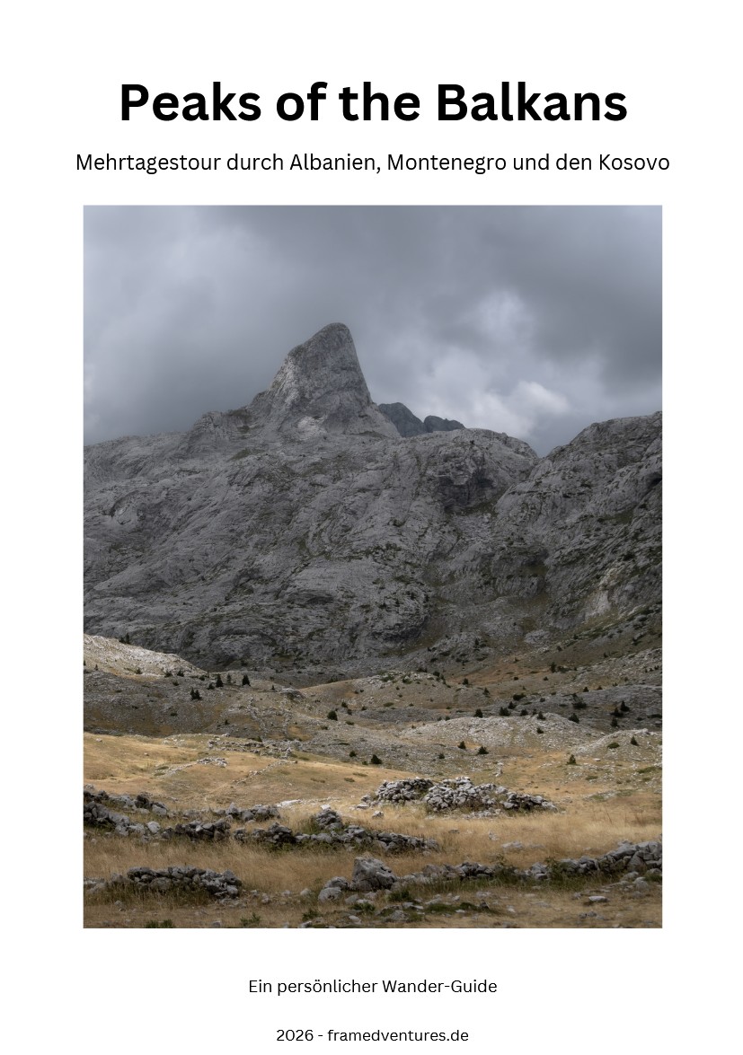 Titelbild des Wanderführers „Peaks of the Balkans“ mit Berglandschaft der Albanischen Alpen unter dramatischem Himmel.